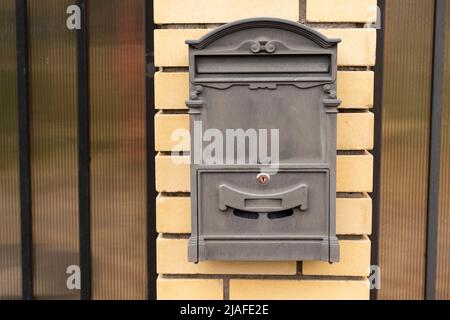 elegant mailbox on the door of a private house Stock Photo