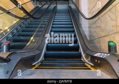 Modern escalators in a shopping mall without people Stock Photo