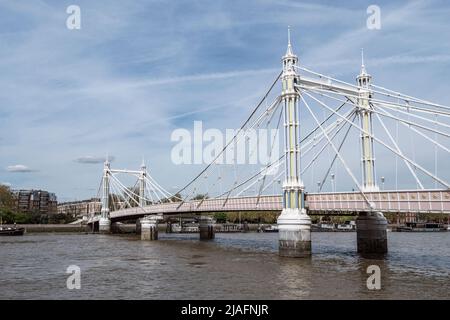 Albert bridge viewed from the south bank of the River Thames in Battersea, Wandsworth, South London, UK. Stock Photo