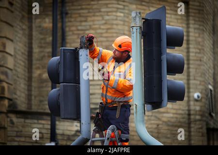 Halifax West Yorkshire, engineer fixing the traffic lights Stock Photo