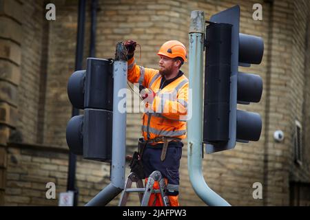 Halifax West Yorkshire, engineer fixing the traffic lights Stock Photo