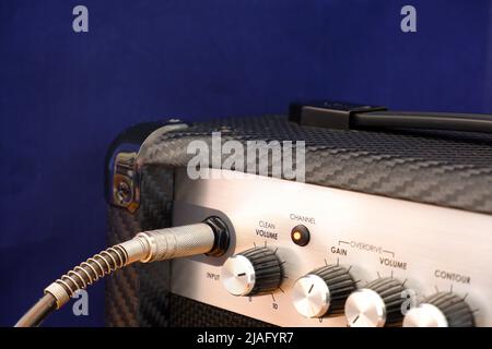 Guitar amplifier and control knobs close up Stock Photo