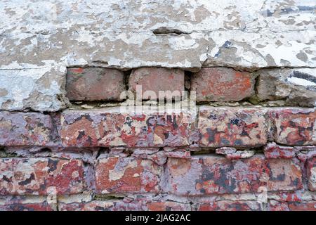 Old crumbling red brick masonry close up Stock Photo