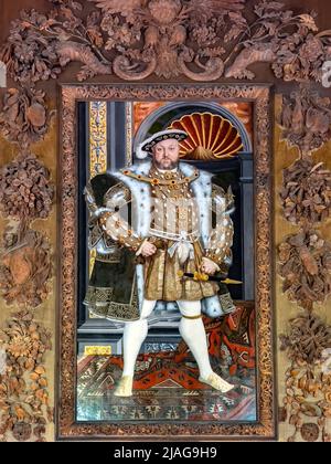 King Henry the VIII in the Carved Room at Petworth House in West Sussex, United Kingdom.  Petworth is a late 17th-century Grade I listed country house Stock Photo