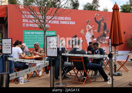 Paris, France. 30th May, 2022. Visitors to Roland Garros have a snack between matches during the French Tennis Open match at Roland Garros near Paris, France, on Monday, May 30, 2022. Photo by Maya Vidon-White/UPI Credit: UPI/Alamy Live News Stock Photo