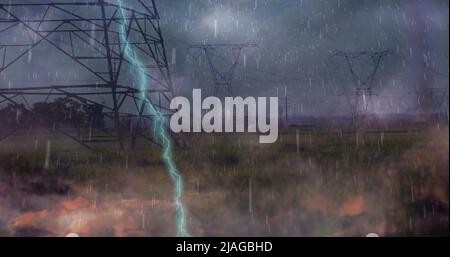 Image of heavy rain, storm with lightning and grey clouds over electric pylons Stock Photo