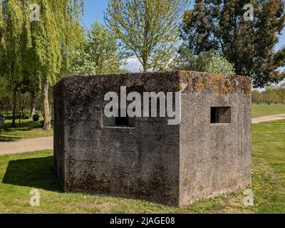 Second World War Pillbox - A pillbox is a type of blockhouse, or concrete dug-in guard-post, normally equipped with loopholes through which defenders Stock Photo