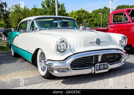 1956 Oldsmobile 98 DHC Holiday Coupé classic car at Rosmalen, The Netherlands - May 10, 2015 Stock Photo