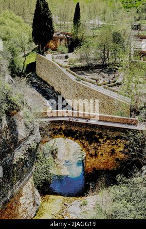 Ronda, Malaga, Spain - People on Arab Bridge, the oldest bridge in Ronda Stock Photo