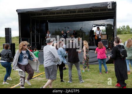 Audience take to their feet to Dance, during  the Toploader Set, at the Deal Classic Car Show, Betteshanger Park, Kent Stock Photo