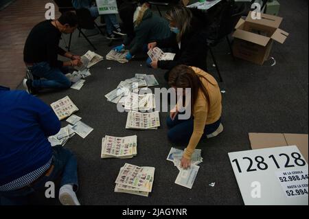 Electoral jury members count votes after elections rally ended during the 2022 Presidential elections in Bogota, Colombia on May 29, 2022. Photo by: Chepa Beltran/Long Visual Press Stock Photo