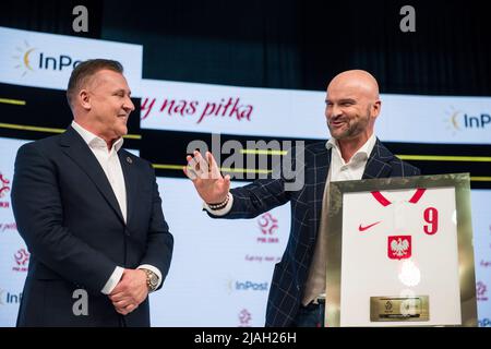 Warsaw, Poland, 30/05/2022, Warsaw, Poland. 30th May, 2022. Rafal Brzoska gestures to Cezary Kulesza during the press conference. The Polish Football Association officially announced during a press conference at the National Stadium that InPost became the new strategic sponsor.The conference was attended by PZPN's (Polish Football Association) president Cezary Kulesza and Rafal Brzoska, president of InPost, known as Poland's parcel king, who invented the automated e-commerce lockers. It is estimated that approximately 16 million Poles use InPost's automated parcel lockers. Credit: SOPA Images  Stock Photo