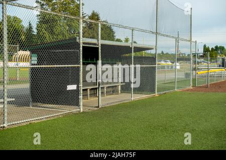 Woodinville, WA USA - circa May 2022: Angled view of the dugout on a baseball field, without any people around. Stock Photo