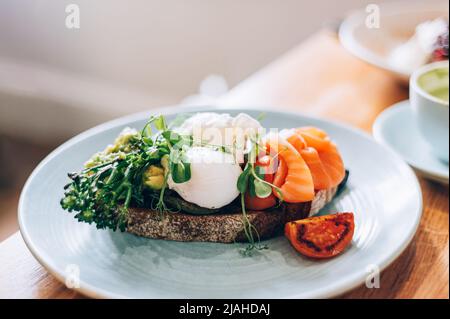 Healthy breakfast from poached eggs and veggies Stock Photo
