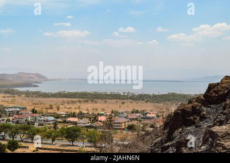 High angle view of Nakuru Town against the background of Lake Nakuru, Kenya Stock Photo