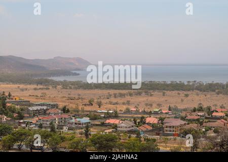 High angle view of Nakuru Town against the background of Lake Nakuru, Kenya Stock Photo