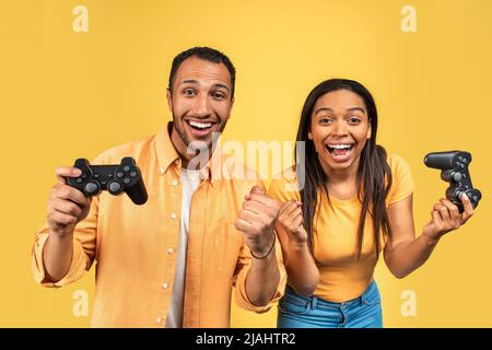African American Boyfriend Winning Video Game Girlfriend Stock Photo by  ©EdZbarzhyvetsky 181571646