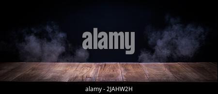 Oak wood planks platform, podium or table with smoke in the dark Stock Photo