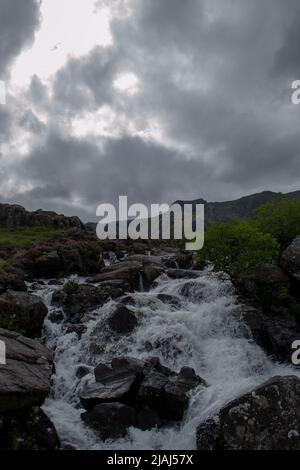 Stunning Waterfall on walk to The Devil's Kitchen, located in Snowdonia National Park, North Wales, United Kingdom. Stock Photo