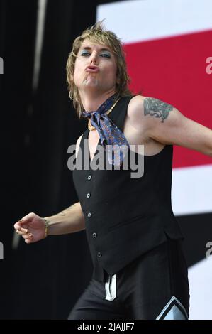 Lead singer Luke Spiller is shown performing on stage during a live concert appearance The Struts during the Boston Calling music festival held in Allston, Massachusetts on May 27, 2022. Stock Photo