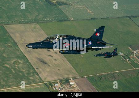 A pair of Royal Canadian Air Force CT-155 Hawk training jets in flight. Stock Photo