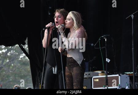 Lead singer Luke Spiller and special guest Paris Jackson are shown performing on stage during a live concert appearance The Struts during the Boston Calling music festival held in Allston, Massachusetts on May 27, 2022. Stock Photo