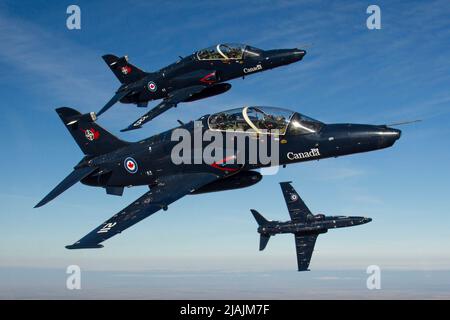 A trio of Royal Canadian Air Force CT-155 Hawk training jets break for the camera.. Stock Photo