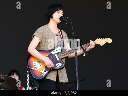 Singer, songwriter and guitarist Nora Cheng is shown performing on stage during a live concert appearance with Horsegirl at the Boston Calling music festival in Allston, Massachusetts on May 29, 2022. Stock Photo