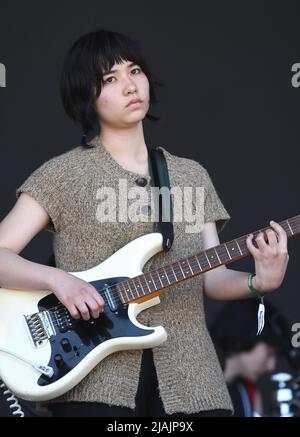 Singer, songwriter and guitarist Nora Cheng is shown performing on stage during a live concert appearance with Horsegirl at the Boston Calling music festival in Allston, Massachusetts on May 29, 2022. Stock Photo