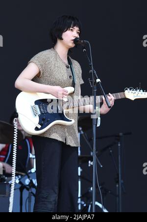 Singer, songwriter and guitarist Nora Cheng is shown performing on stage during a live concert appearance with Horsegirl at the Boston Calling music festival in Allston, Massachusetts on May 29, 2022. Stock Photo