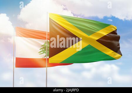 Jamaica And Lebanon Flags Waving Together In The Wind On Blue Cloudy 