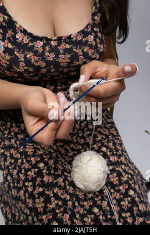 Hand Knitting Creativity creativity and skill with hands knitting with crochet and wool, craft ...