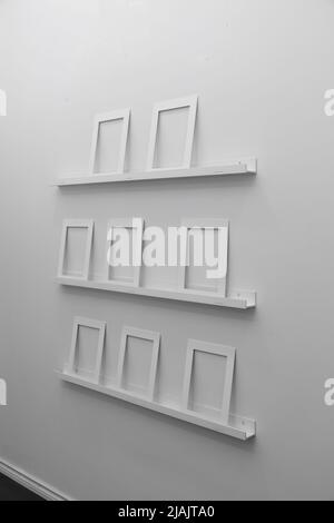wall decoration with straight lines forming geometric figures like squares in an orderly way, abstract wallpaper Stock Photo
