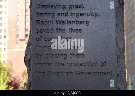 Raoul Wallenberg Monument, at the United Nations Plaza, detail, dedication inscription carved in stone, New York, NY, USA Stock Photo
