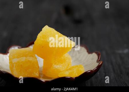 Yellow Rock sugar or Crystal Sugar, Popular in Indonesia for Traditional Herbal Drink Wedang Uwuh Stock Photo