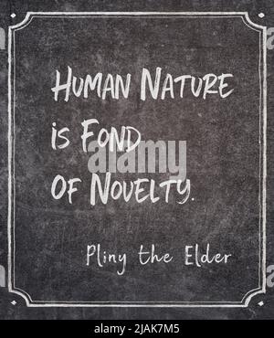 Human nature is fond of novelty - ancient Roman author Pliny the Elder quote written on framed chalkboard Stock Photo