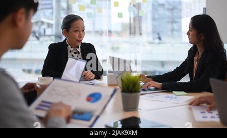 Picture Idea: Experienced Leader Giving Instructions To The Employee On Office Work