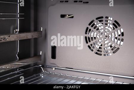 Modern electric oven with telescopic rails, top and bottom heat. Function 3D hot air, thermal grill and convection. Catalytic cleaning system Stock Photo