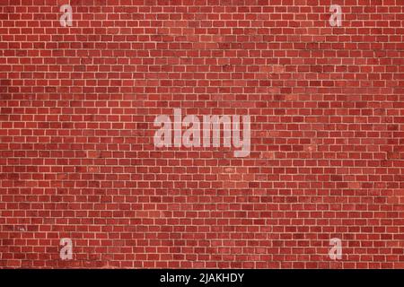 Old Red Brick Wall. An ancient fortress. Medieval red brick building. Big Brick wall background texture. Stock Photo