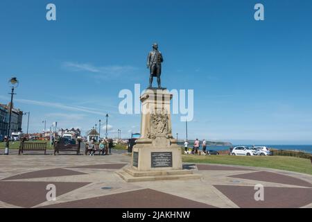 Statue of Captain Cook in front of the Royal Hotel, n Whitby, North Yorkshire, England. Stock Photo