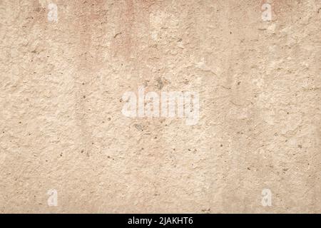 Beige cement wall, abstract light background. Concrete grunge texture, stucco. Plaster surface. Blank space. Design backdrop. Natural grungy wallpaper Stock Photo