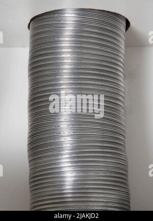 Aluminum corrugation from a kitchen hood. Purification and air supply. Stock Photo