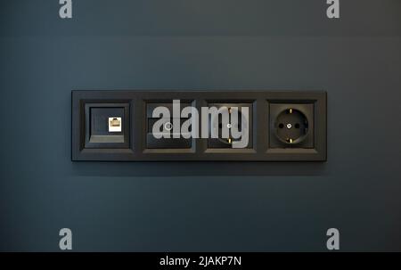 LAN cable, TV an EU power sockets Stock Photo