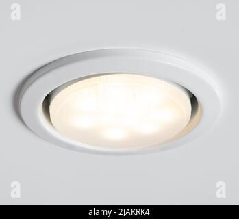 LED built-in lamp on white stretch ceiling. LED celling lamp. Stock Photo