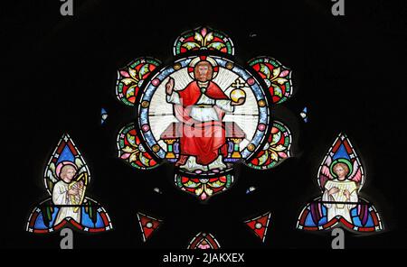 A stained glass window by Frederick Preedy depicting Christ in Majesty, Holy Trinity Church, Arrow, Warwickshire Stock Photo