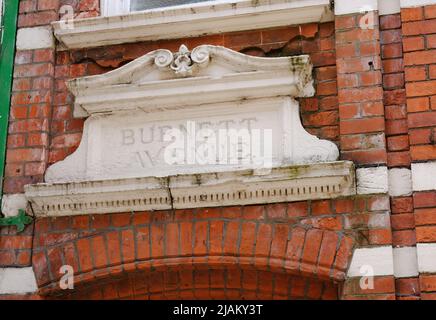 Hull, East Yorkshire, UK. May 21, 2022 An old street sign in the Old Town with elegant, scrolled stone carving Stock Photo
