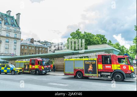 London, UK. 31st May, 2022. Fire engines wait outside - London Fire Brigade, the Police and the Ambulance sevice, including the Air Ambulance attend an incident at Green Park tube station. It was reported that there was a person under a train but the air ambulance was not needed and the the mergency services left soon after. Credit: Guy Bell/Alamy Live News Stock Photo