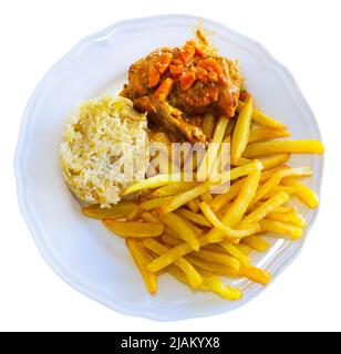 Chicken thigh served with baked potatoes Stock Photo - Alamy