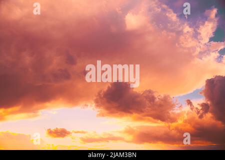 Amazing natural bright dramatic sky in different colours during sunset sunrise time. Colorful sky background. Beauty in nature. Sunset sky natural Stock Photo