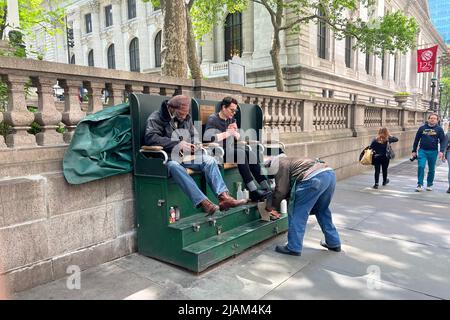 Shoeshine stand on 42nd Stgreet at 5th Avenue outside the New York Public Library in Manhattan. Stock Photo